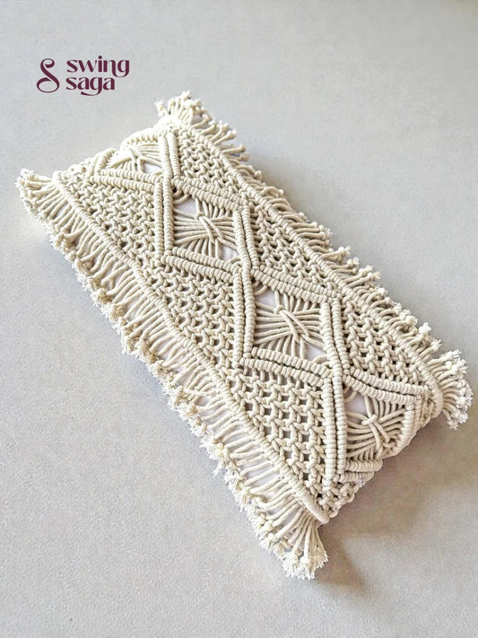 Macrame phone case with geometric pattern on a light gray background